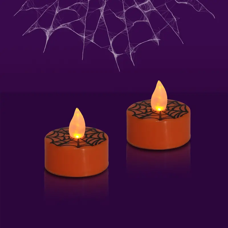 Set De 2 Velas Color Naranja Con Estampado De Telaraña 1