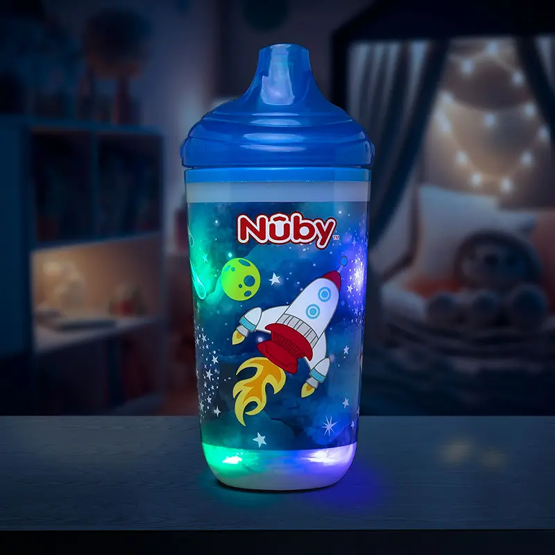 Vaso Entrenador Antiderrames Térmico Con Boquilla Nuby 360° Luminoso Color Azul 10Oz. 1