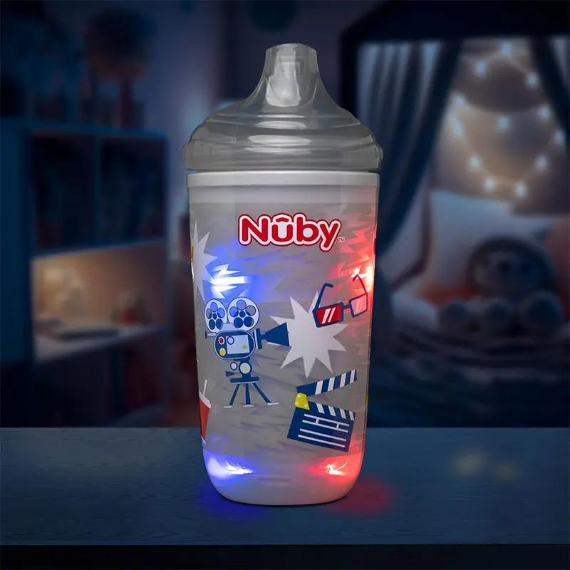 Vaso Entrenador Antiderrames Térmico Con Boquilla Nuby 360° Luminoso Color Gris 10Oz. 1