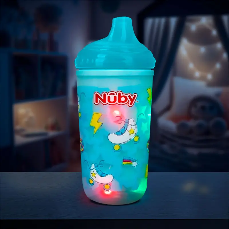 Vaso Entrenador Antiderrames Térmico Con Boquilla Nuby 360° Luminoso Color Turquesa 10Oz. 1